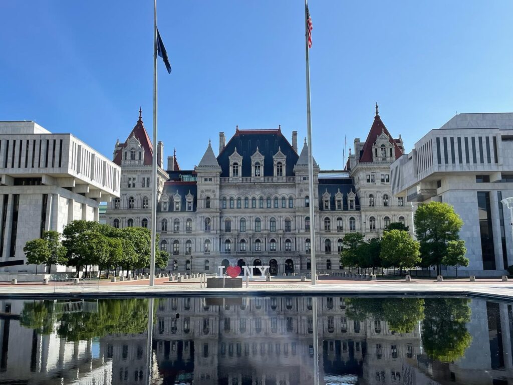 Photo of the NYS CApitol on a sunny day.